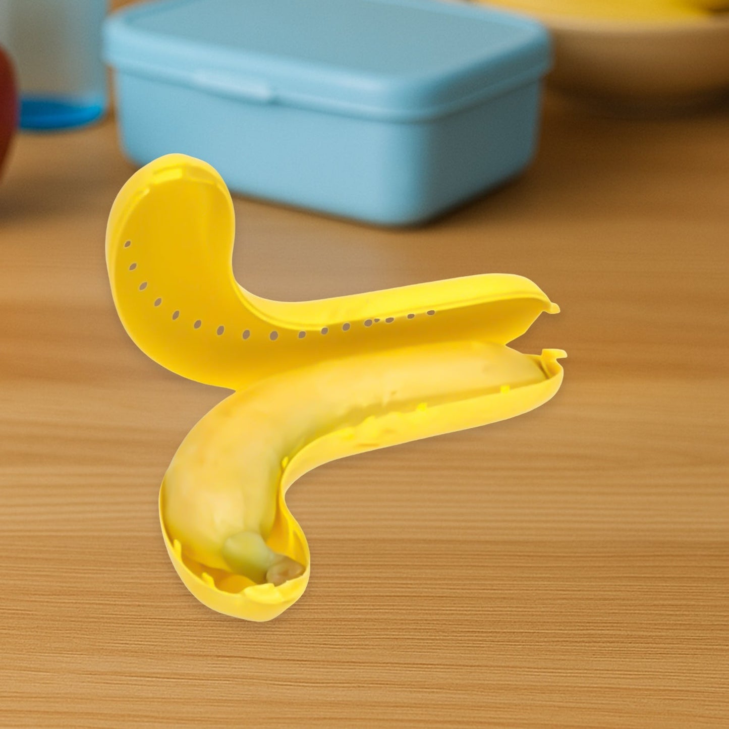 “banana shaped lunch box yellow”